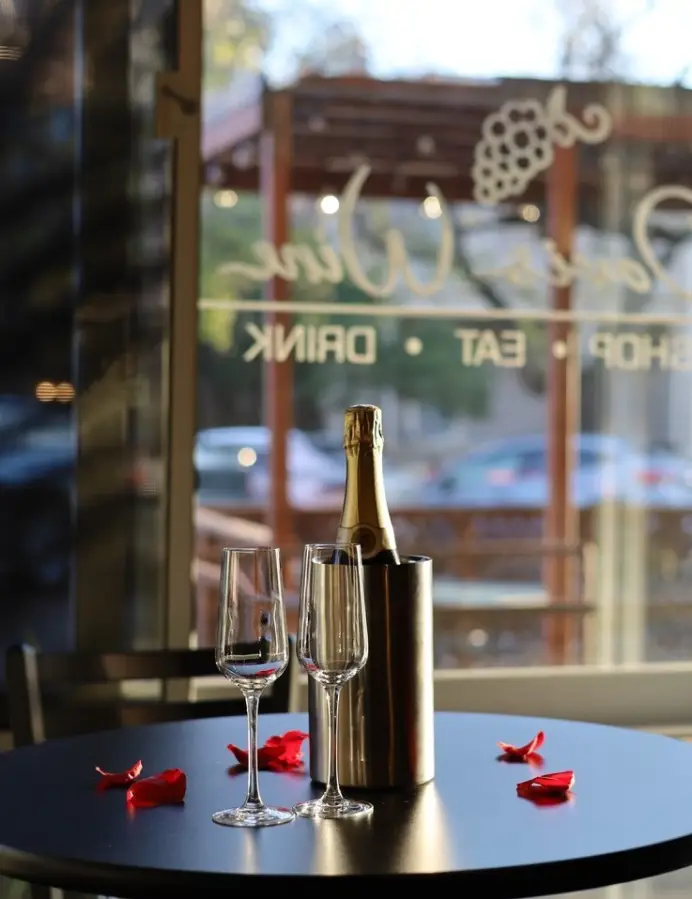 Champagne bottles on a table at Davis Wine Bar