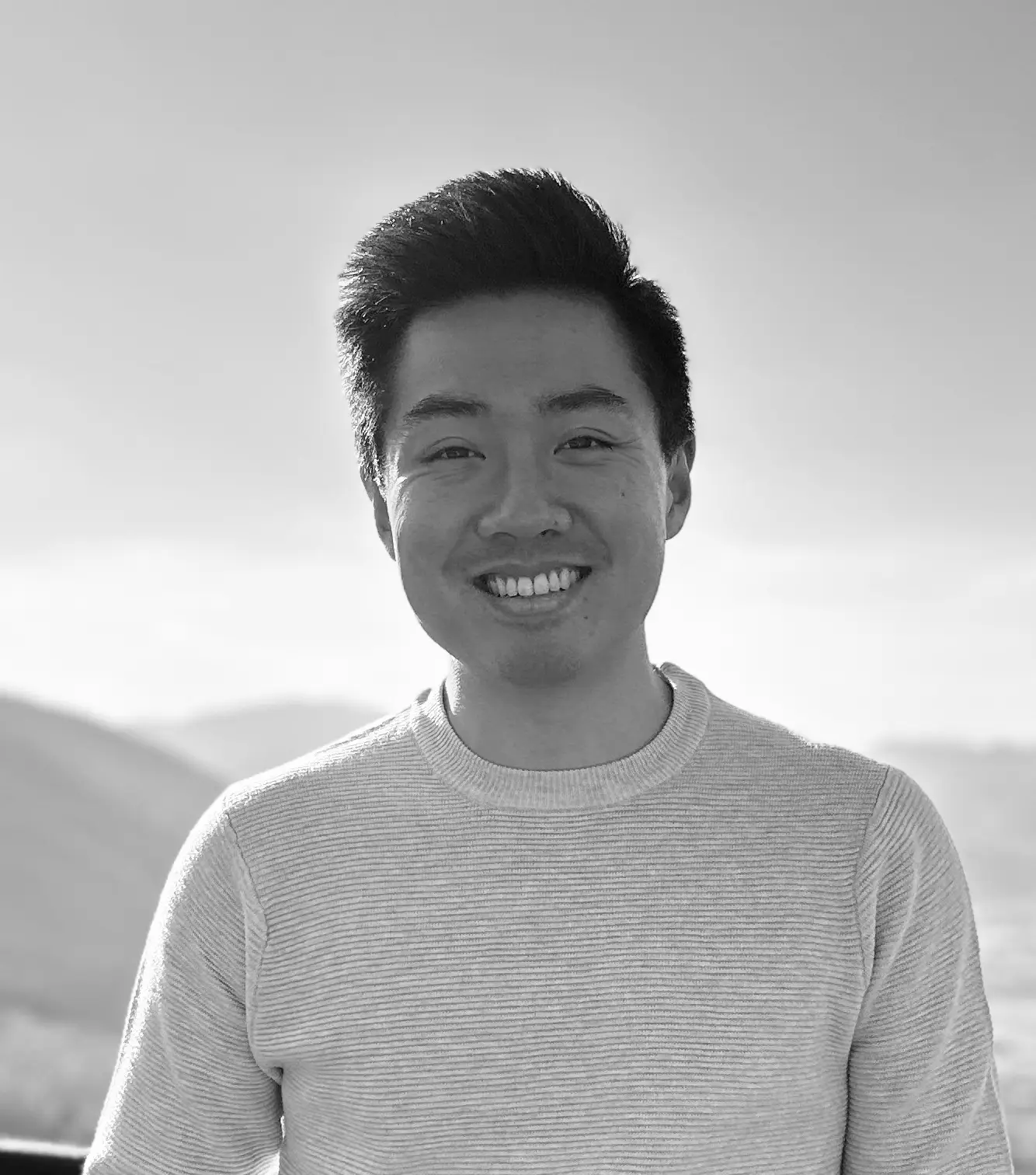 Black and white photo of Lucas, the groom