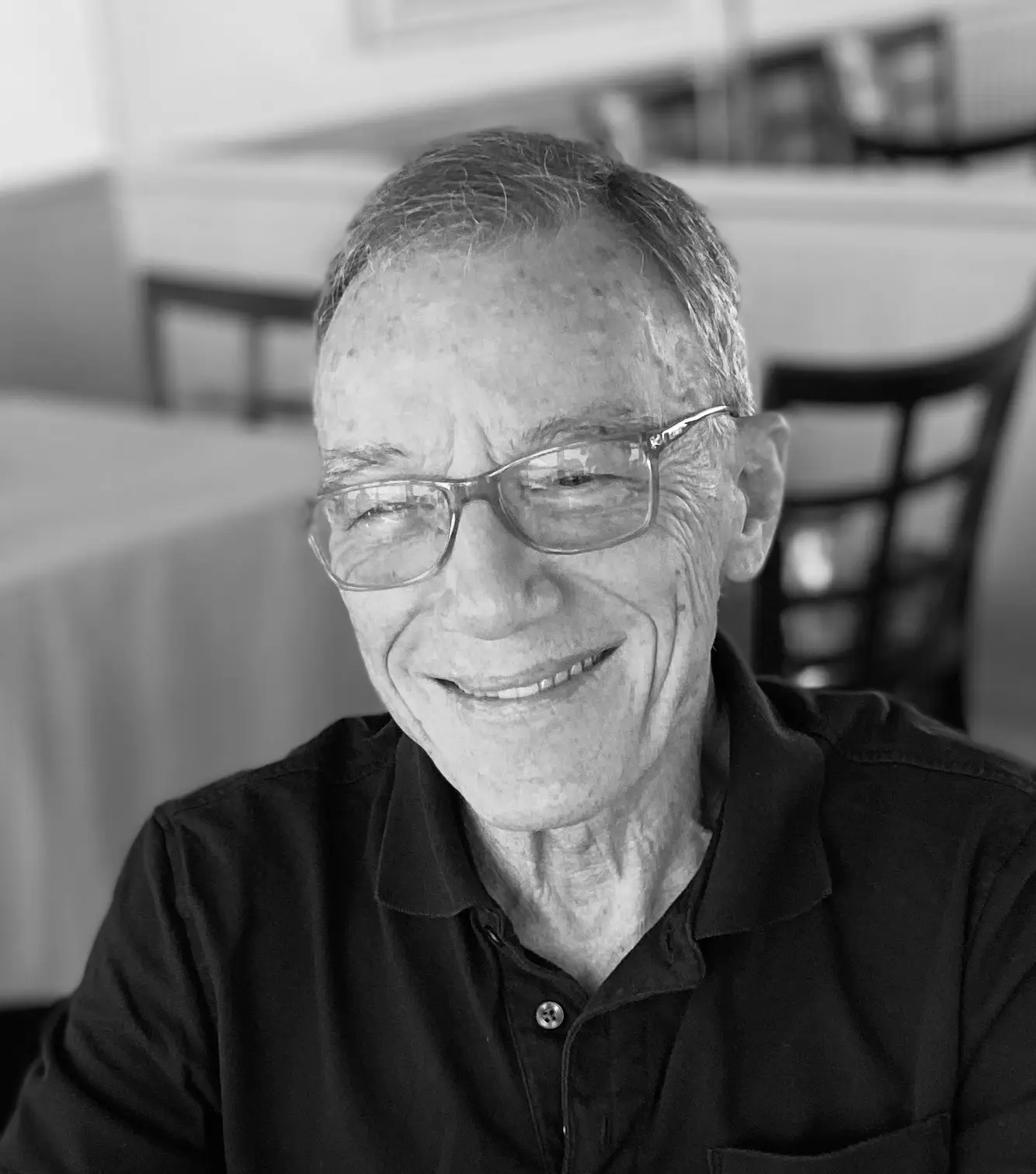 Black and white photo of Marcel, the father of the bride